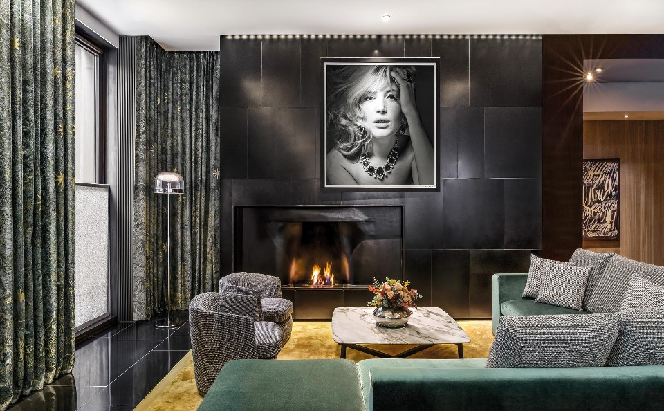 The fireplace in the Bulgari Lounge at Bulgari Hotel London