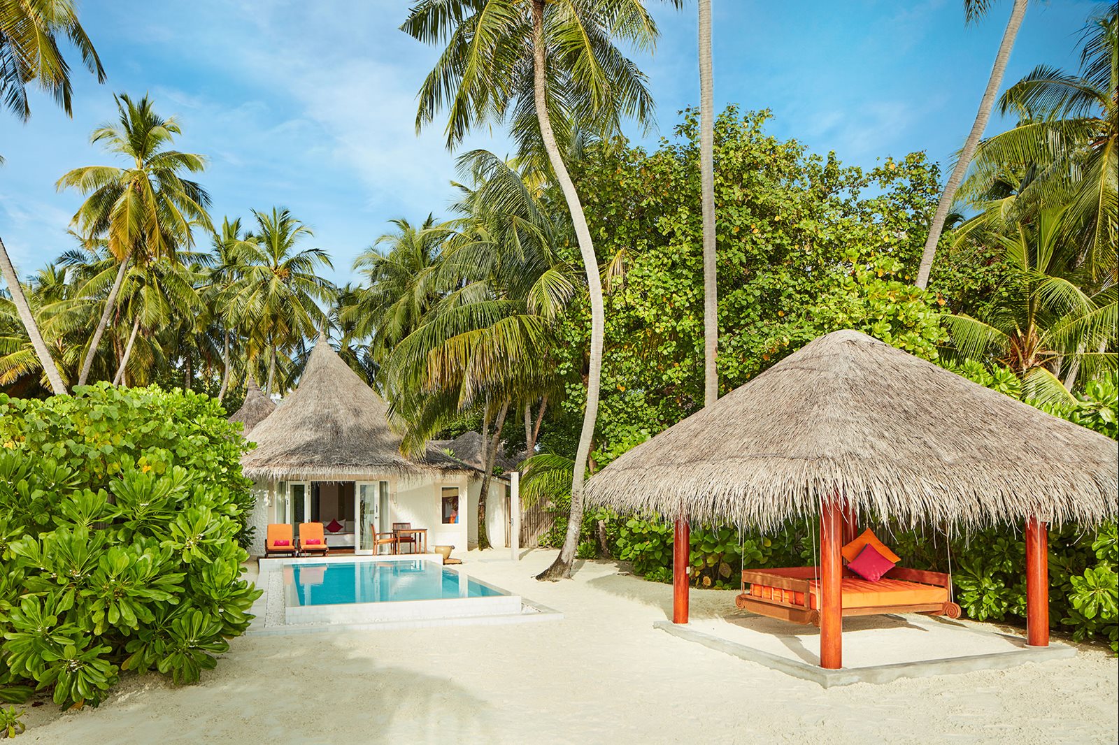 Sun Siyam Vilu Reef Sun Aqua pool villa with private deck and plunge pool over the Maldivian lagoon
