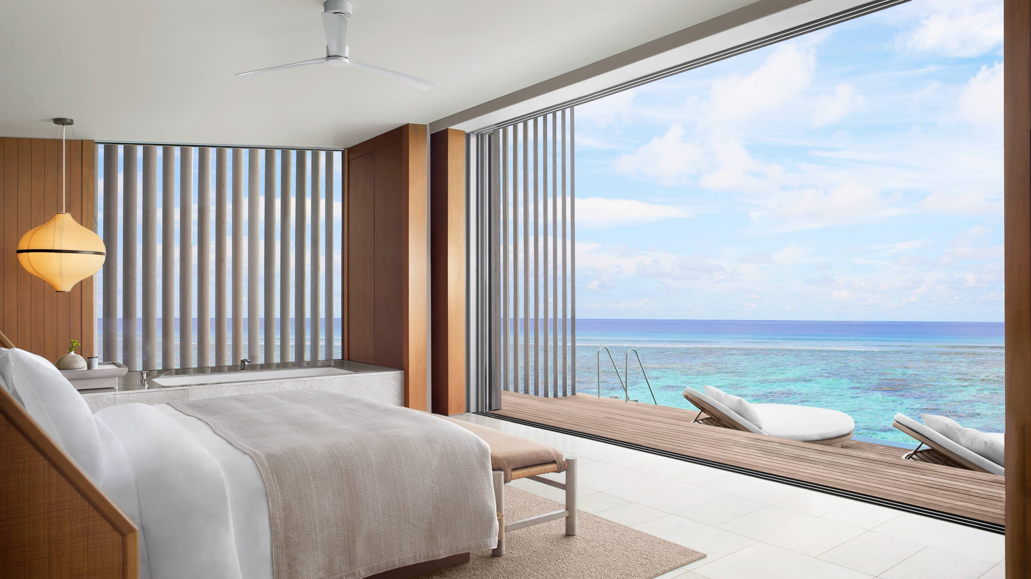 Bedroom of a villa at The Ritz-Carlton Maldives, Fari Islands with ocean view