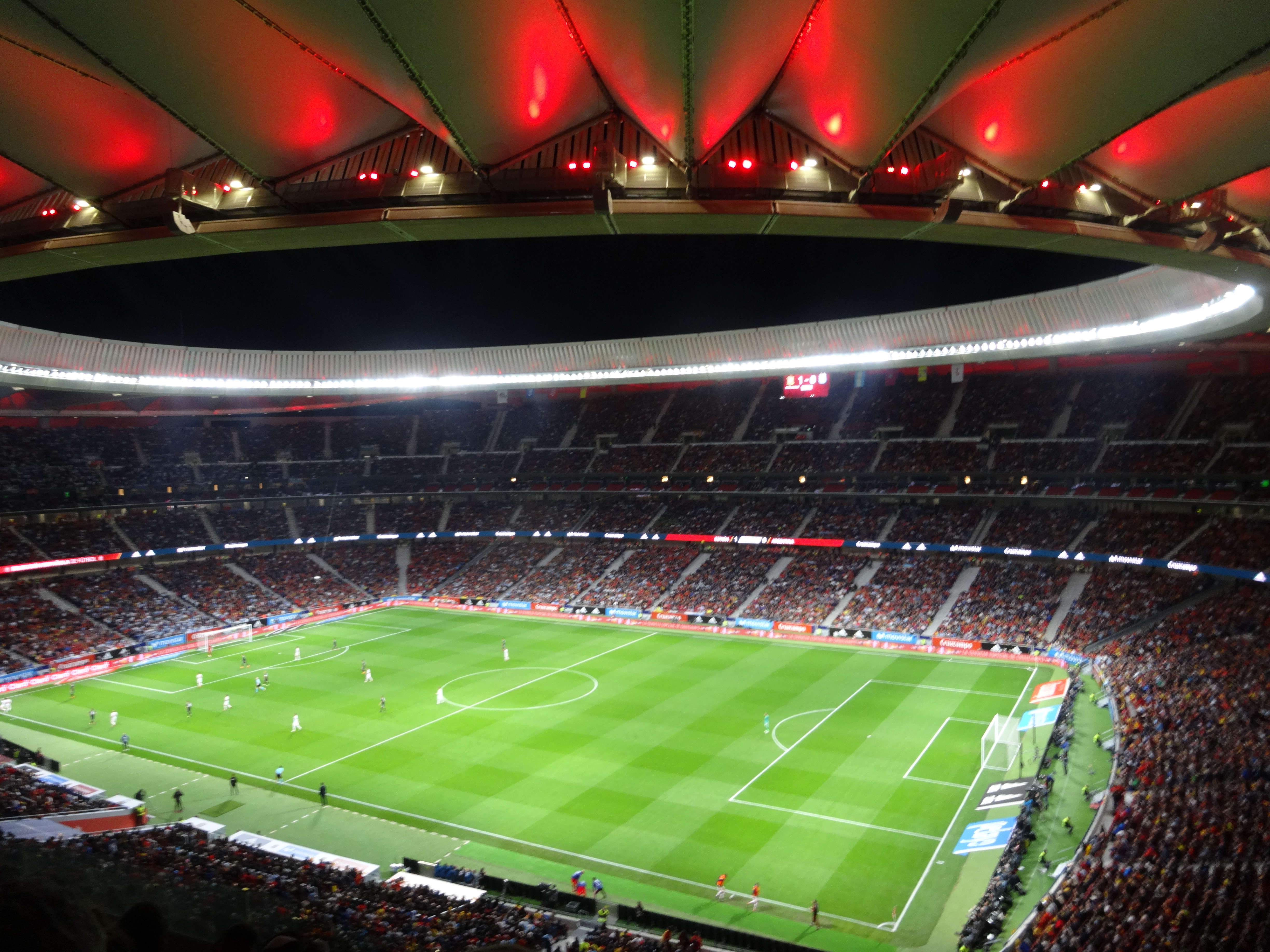 Estadio Metropolitano in Madrid filled for an evening football match