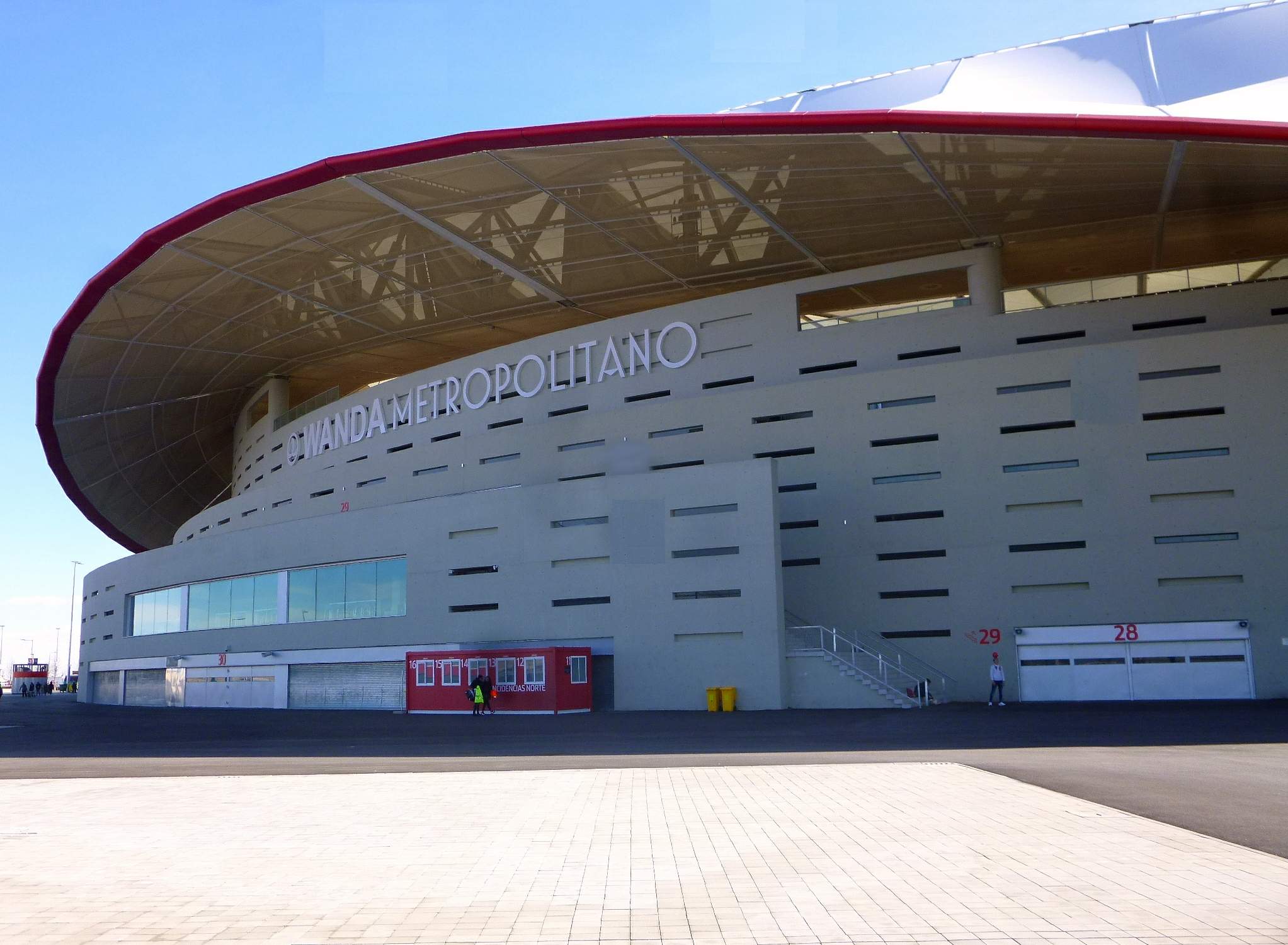 Modern exterior and red roof of Estadio Metropolitano in Madrid