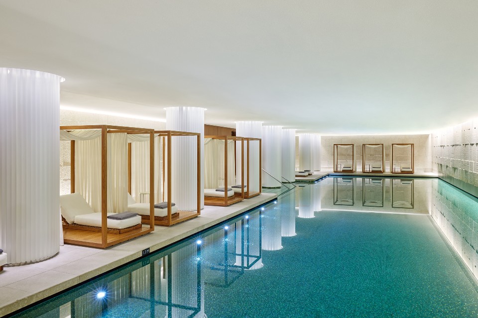 The 25-metre indoor pool at the Bulgari Spa, Bulgari Hotel London, lined in gold mosaic