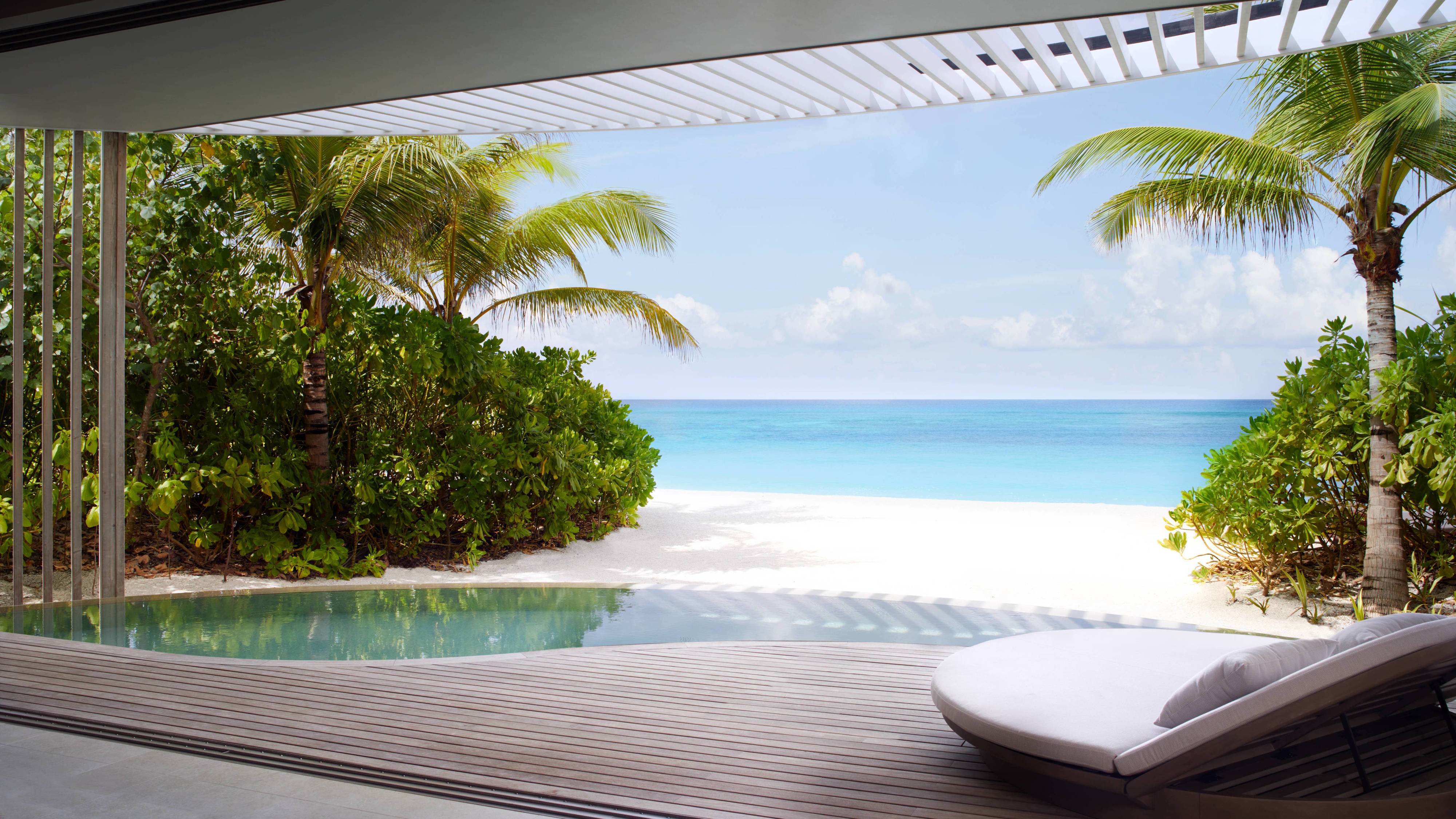 Private sundeck and infinity pool of an overwater villa at The Ritz-Carlton Maldives, Fari Islands