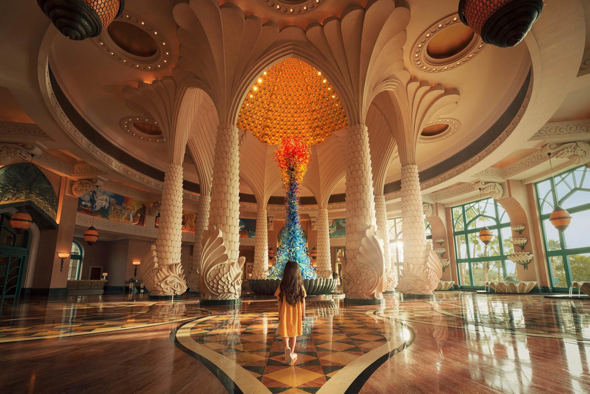 The grand lobby of Atlantis The Palm Dubai with its Dale Chihuly glass sculpture