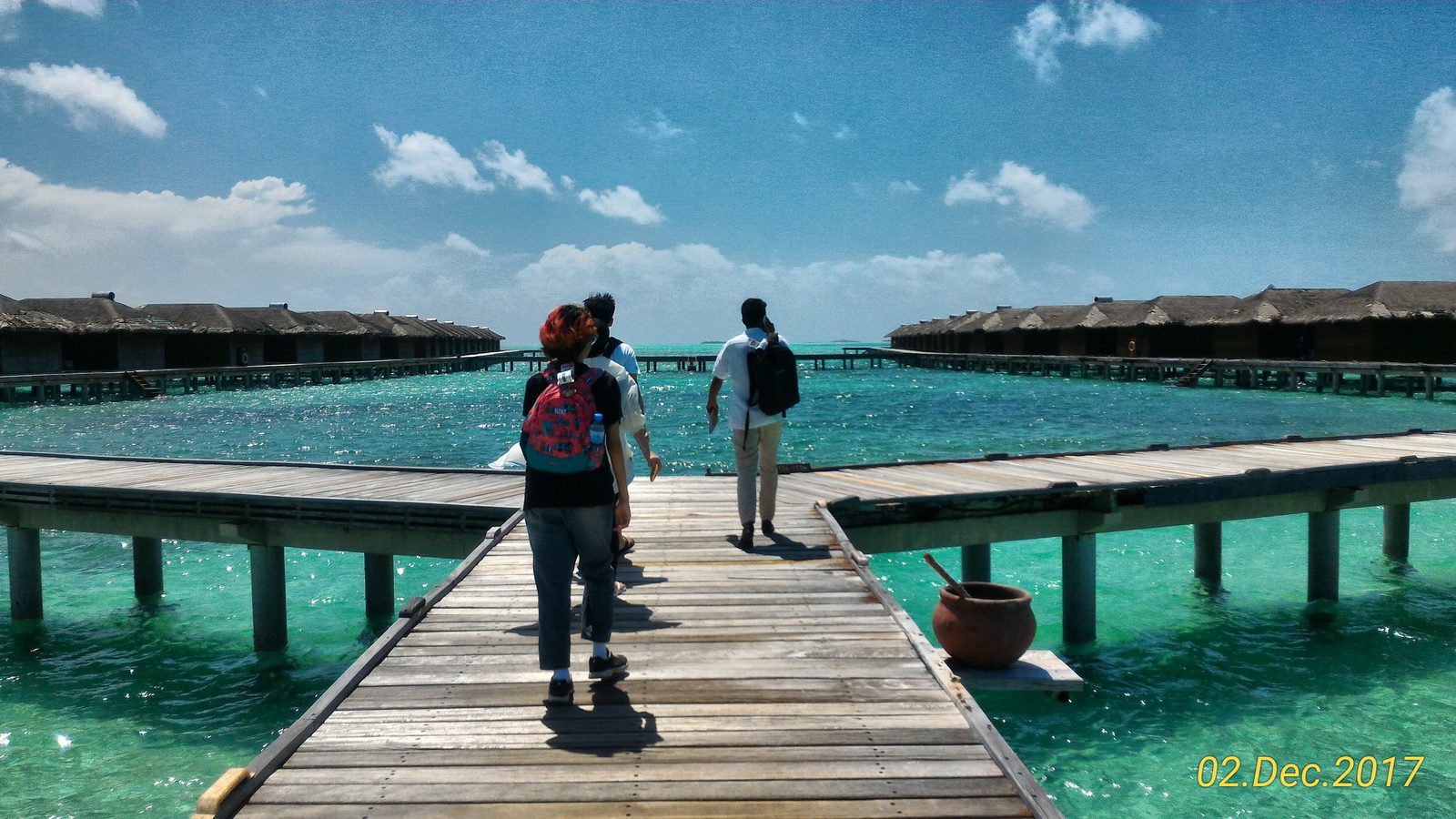 Water villas on stilts at Medhufushi Island Resort in the Maldives