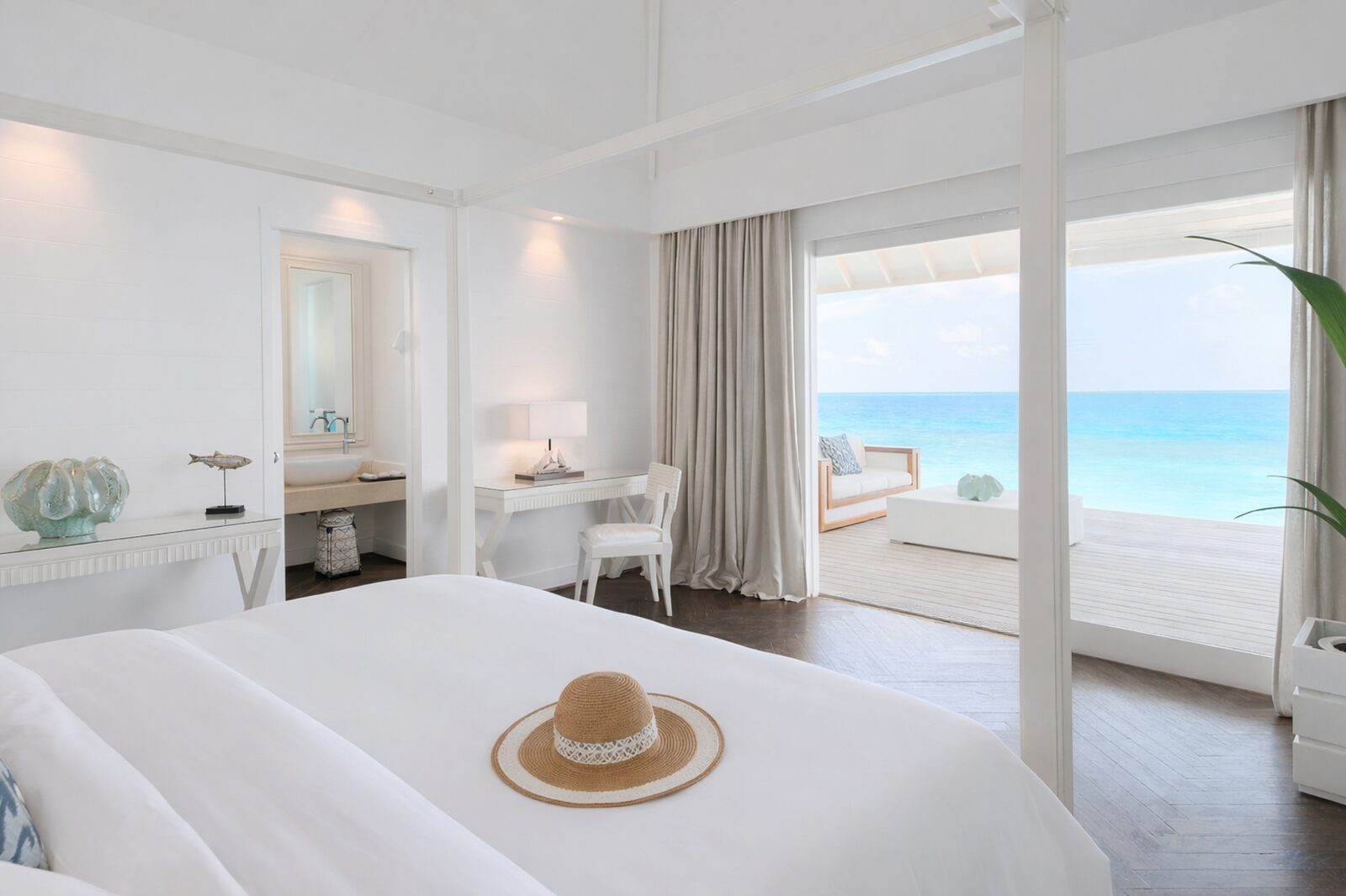 Water villa over the lagoon at Diamonds Thudufushi, Maldives