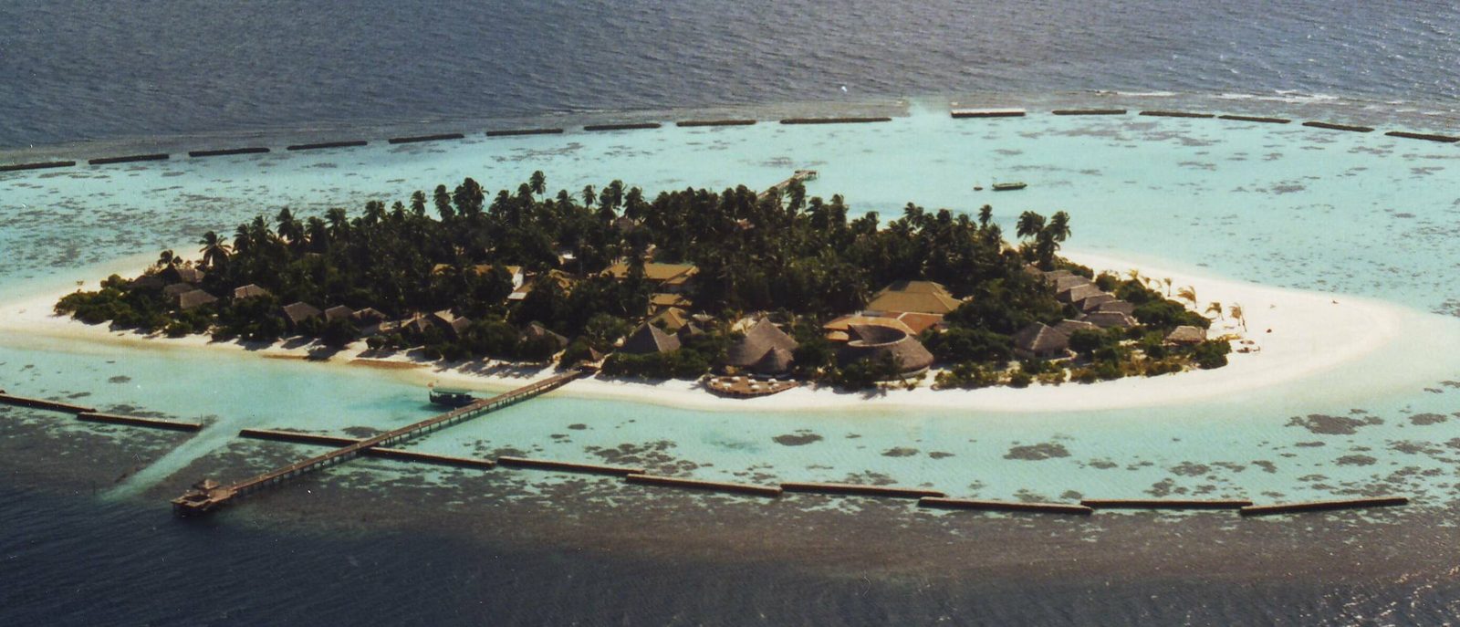 Vakarufalhi island resort in the Maldives surrounded by turquoise reef